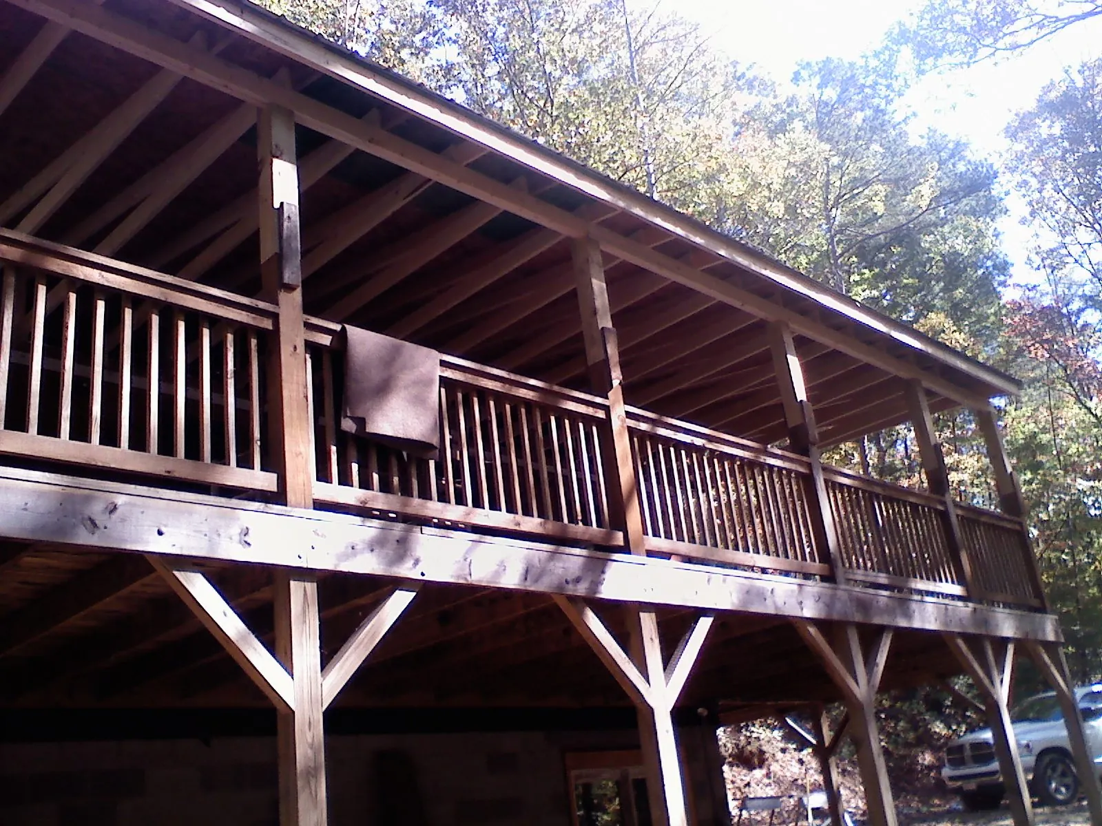 Timber framing under a new elevated porch and deck — Roof Leak Repair in Widen by Roofing Brothers